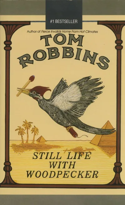 The image is a book cover parody featuring a woodpecker in mid-flight holding a paintbrush in its beak, with a paintbrush…