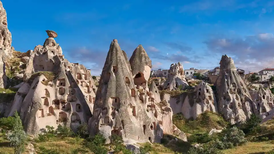 In Cappadocia, Turkey, people have carved out homes within towering formations of soft tuff, volcanic ash hardened over…