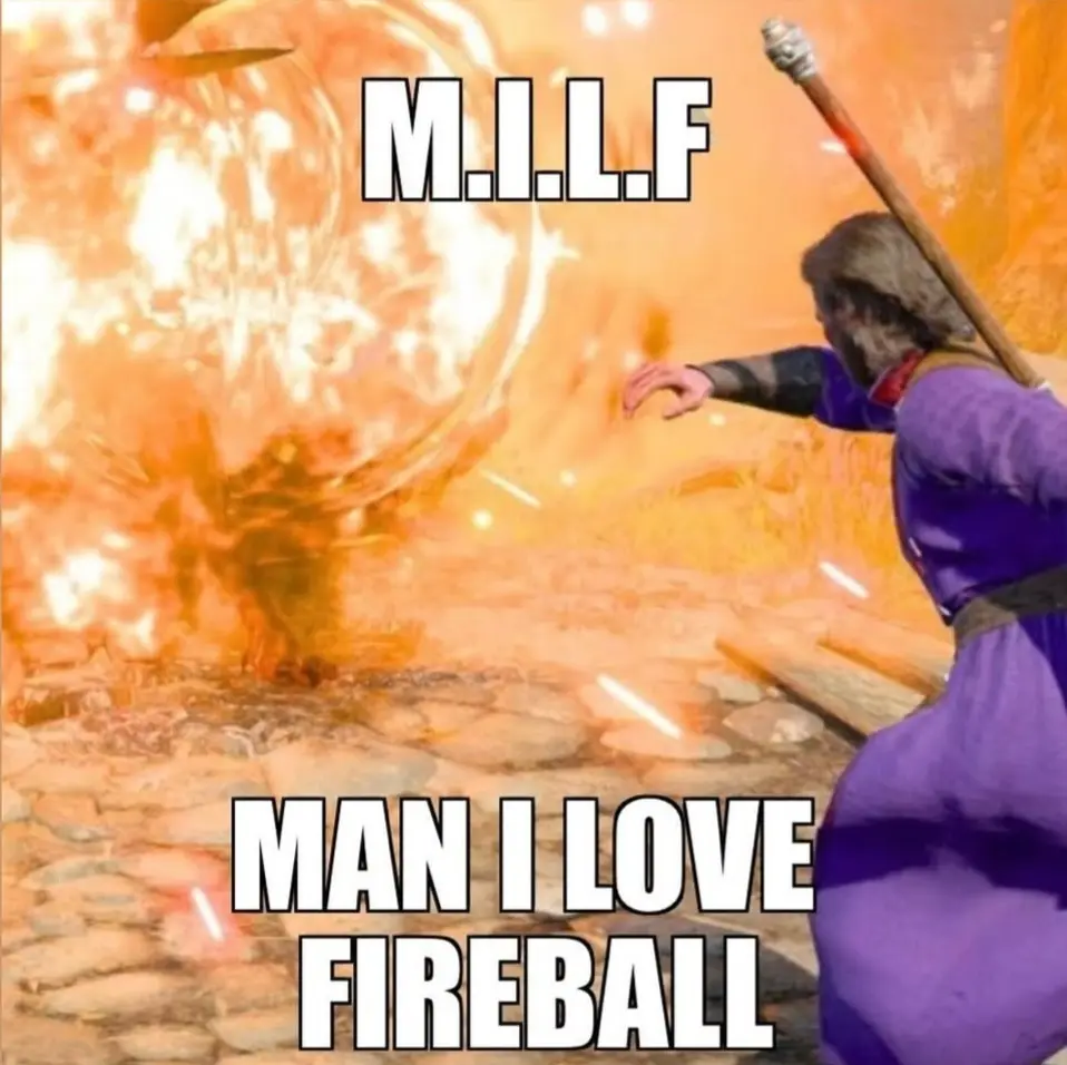 A video game character in a purple robe and wielding a staff is shown casting a large fiery explosion. The text 'M.I.L.L.F'…