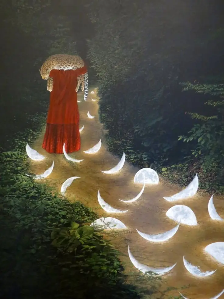 A surreal painting depicts a figure in a long red dress with a leopard's head and upper body emerging from the top of the…