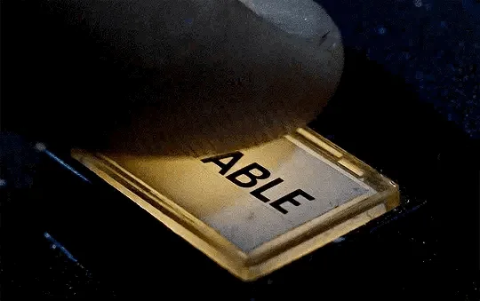 A sequence of three panels shows a finger pressing a button labeled 'ABLE' which then changes to read 'ENABLE' after being…