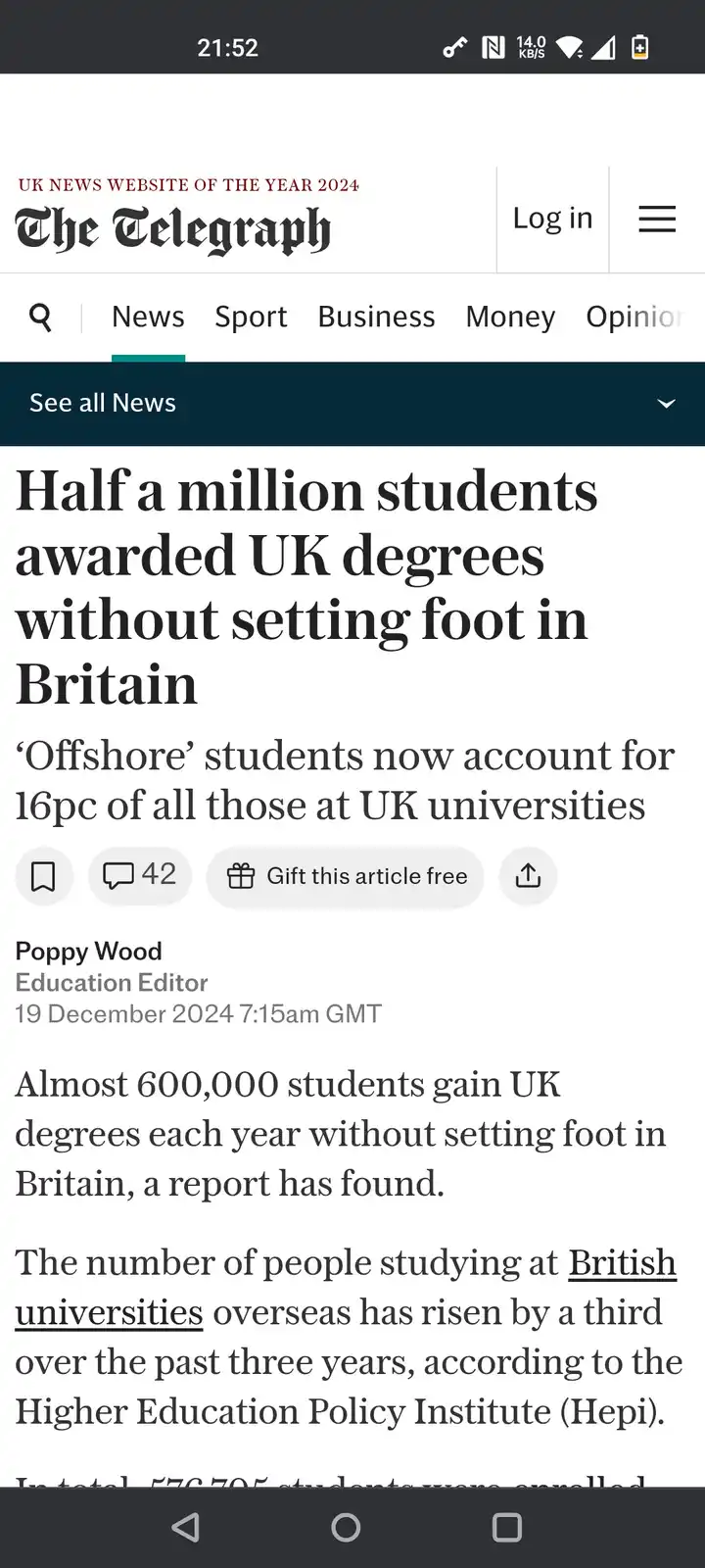 A screenshot of a mobile news article from The Telegraph with the headline 'Half a million students awarded UK degrees…