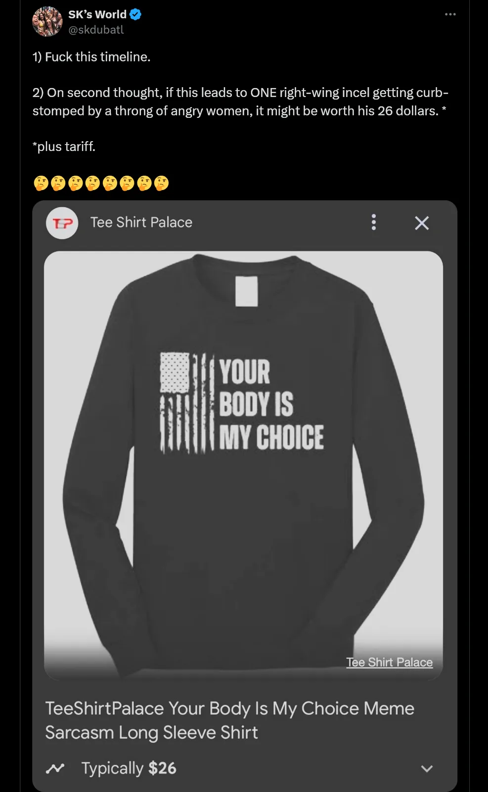 A black long-sleeve shirt displays the phrase 'YOUR BODY IS MY CHOICE' in white text next to a stylized American flag. The…