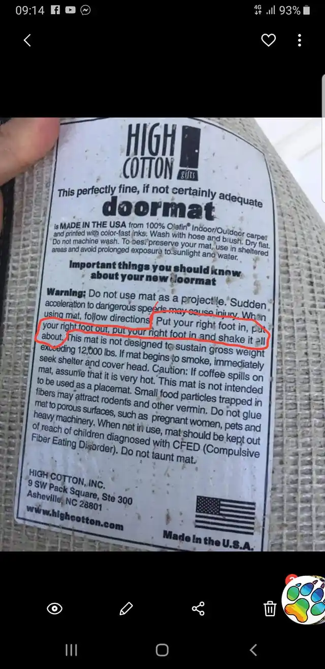 A close-up photo of a dirty doormat's label from 'High Cotton gifts' with a red circle highlighting a warning section. The…