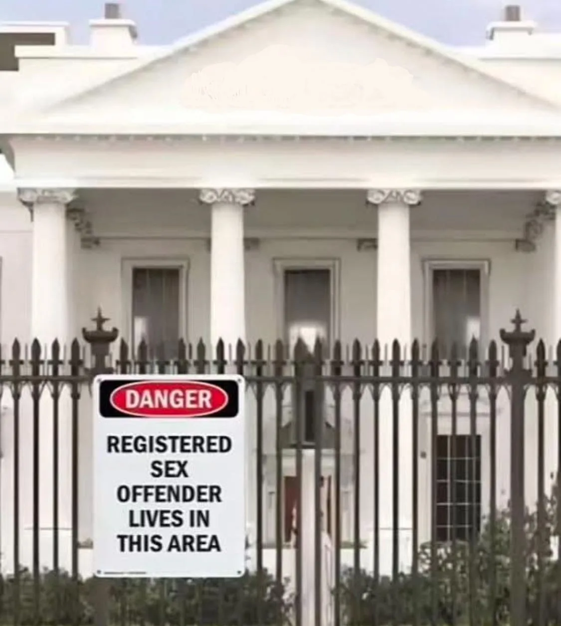 The image shows the White House, the official residence of the U.S. president, with a black metal fence in front. A white…