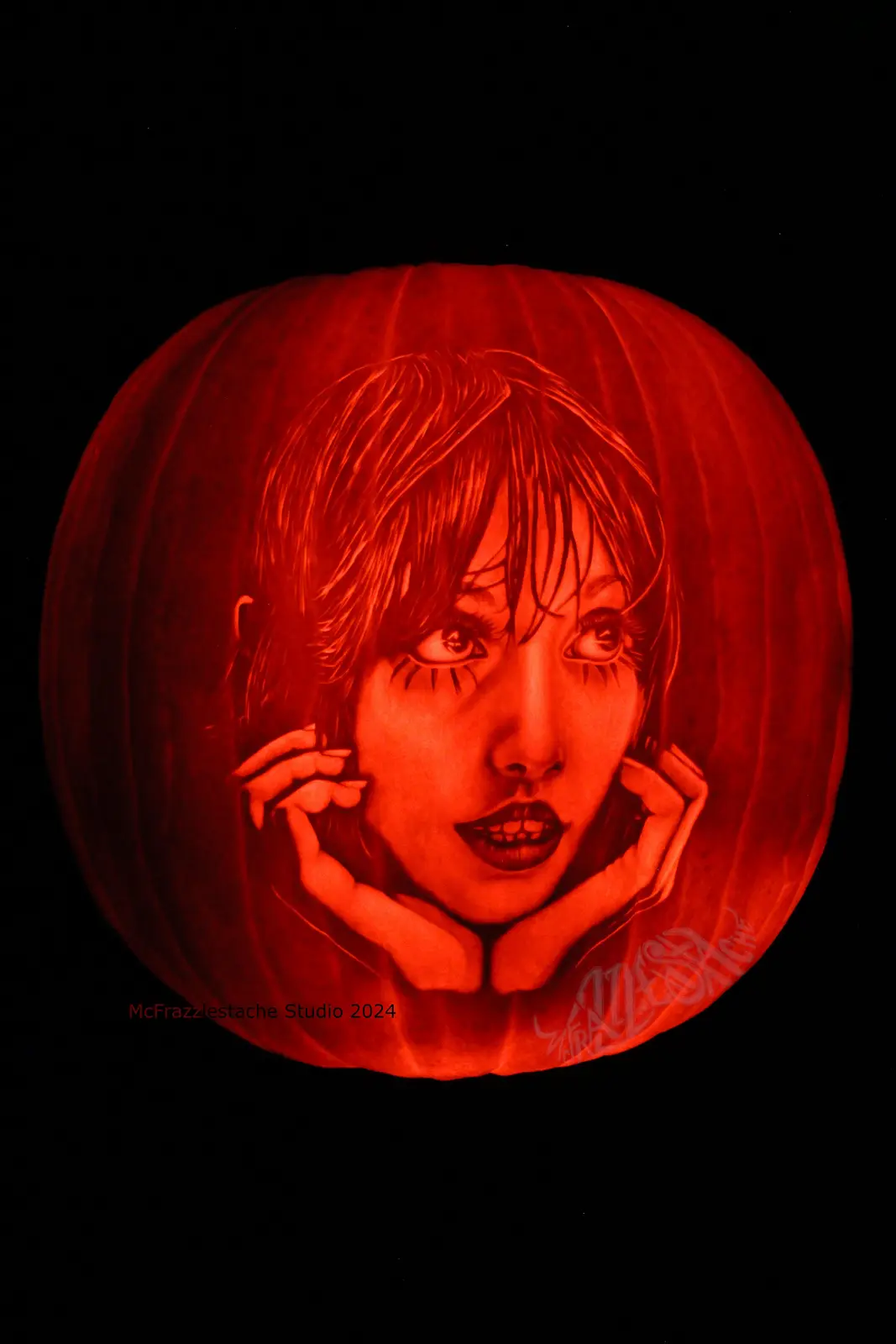 A highly detailed pumpkin carving illuminated from within, depicting a woman with short hair, wide eyes, and hands framing…