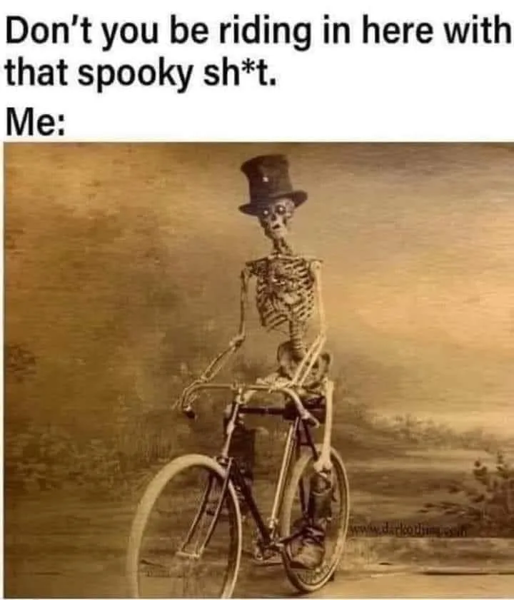 A sepia-toned vintage-style image shows a skeleton wearing a top hat and riding a bicycle. The skeleton is the only visible…