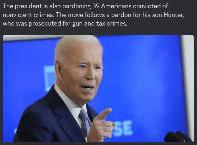 A photo of Joe Biden speaking at a podium with a blue background, pointing forward with his right index finger. Overlaid…