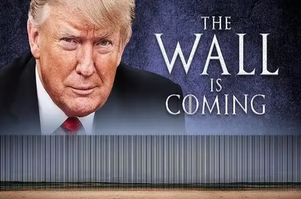 A close-up image of Donald Trump in a suit and red tie, looking serious, is overlaid with the text 'THE WALL IS COMING' in a…