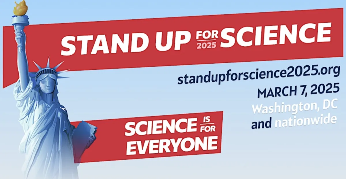 An official-looking promotional graphic for 'Stand Up for Science 2025' features the Statue of Liberty holding a torch and…