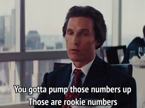 Six identical panels show actor Matthew McConaughey in a pinstripe suit and red tie, seated in an office with a cityscape…
