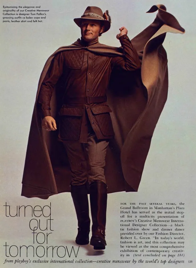 A vintage 1970s Playboy magazine spread features a male model in a brown leather outfit with a large cape and hat, posing…
