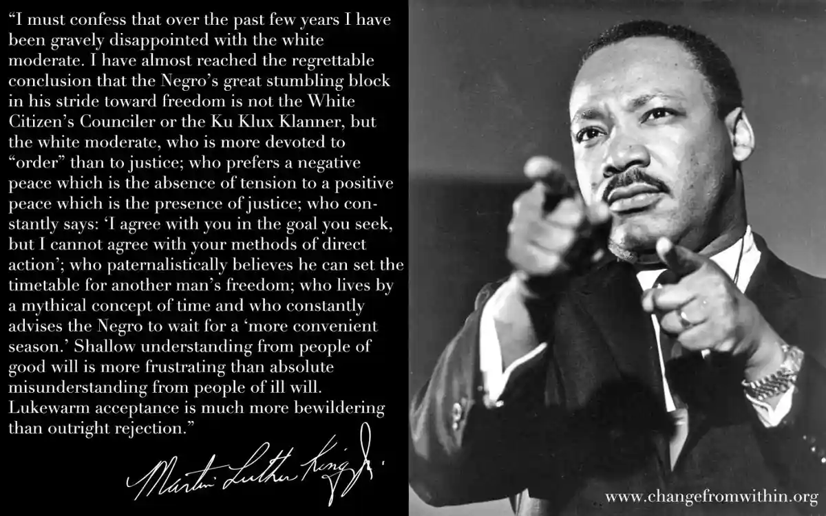 A black-and-white photo of Martin Luther King Jr. pointing directly at the viewer, with a long quote attributed to him on…