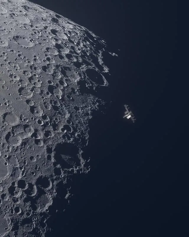 A space station or spacecraft is visible as a small, bright object floating in space next to the cratered surface of the…