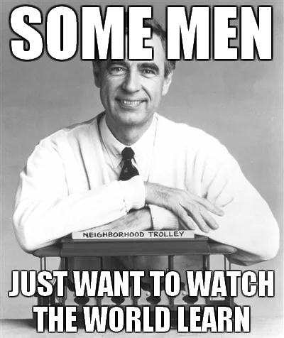 A black-and-white photo of a smiling man in a white shirt and tie, leaning on a desk with a sign that reads 'NEIGHBORHOOD…