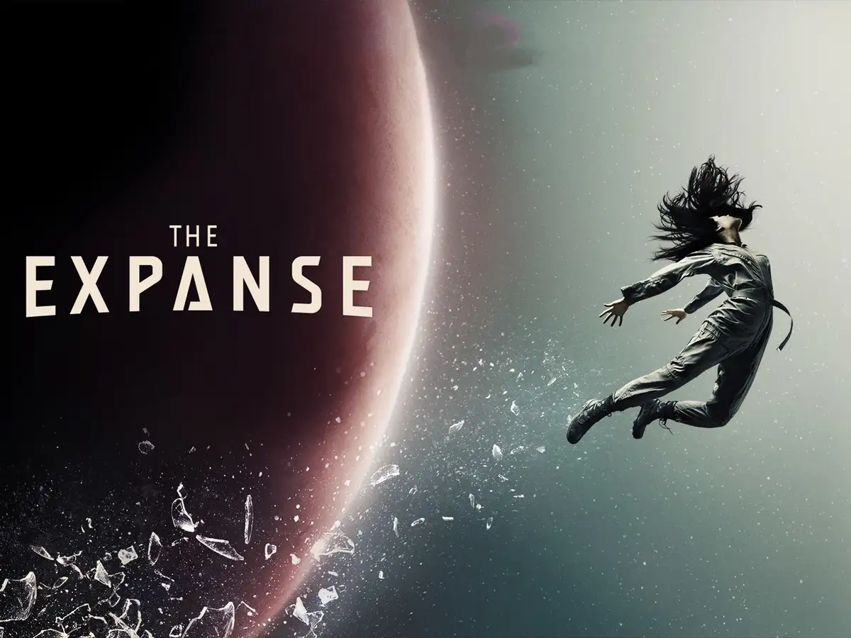 A promotional poster for the TV show 'The Expanse' shows a person in a spacesuit floating in zero gravity near a large…
