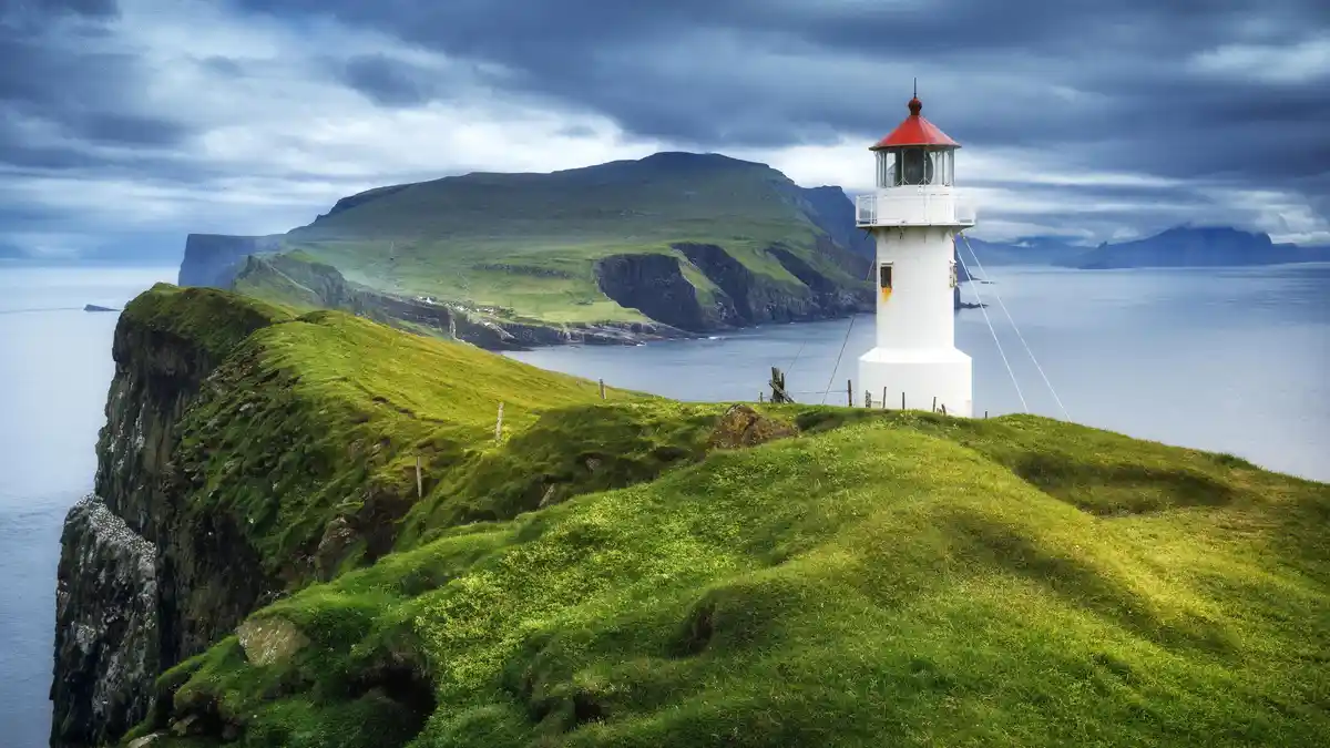 This tiny, remote landmass is connected to Mykines by a footbridge, home to a 110-year-old beacon. HÃÂ³lmur Lighthouse…