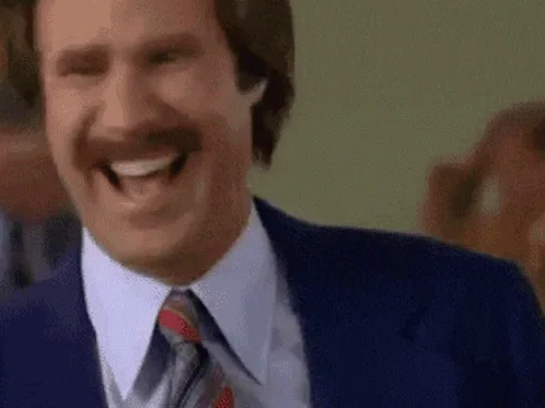 The image shows six panels of a man with a mustache and brown hair wearing a blue suit and tie. He displays a range of…