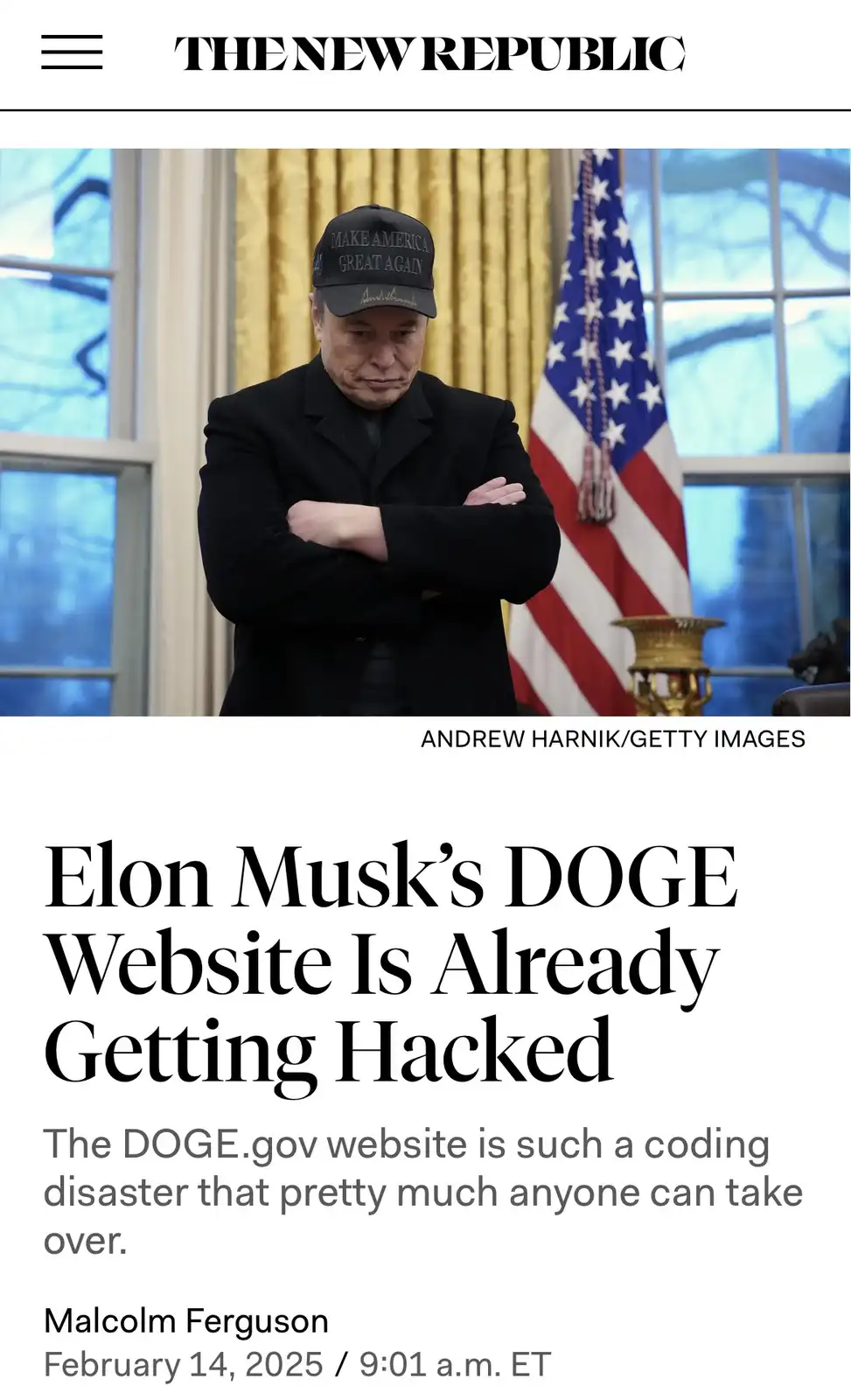 A man in a black suit and a 'Make America Great Again' cap stands with arms crossed in front of an American flag, mimicking…