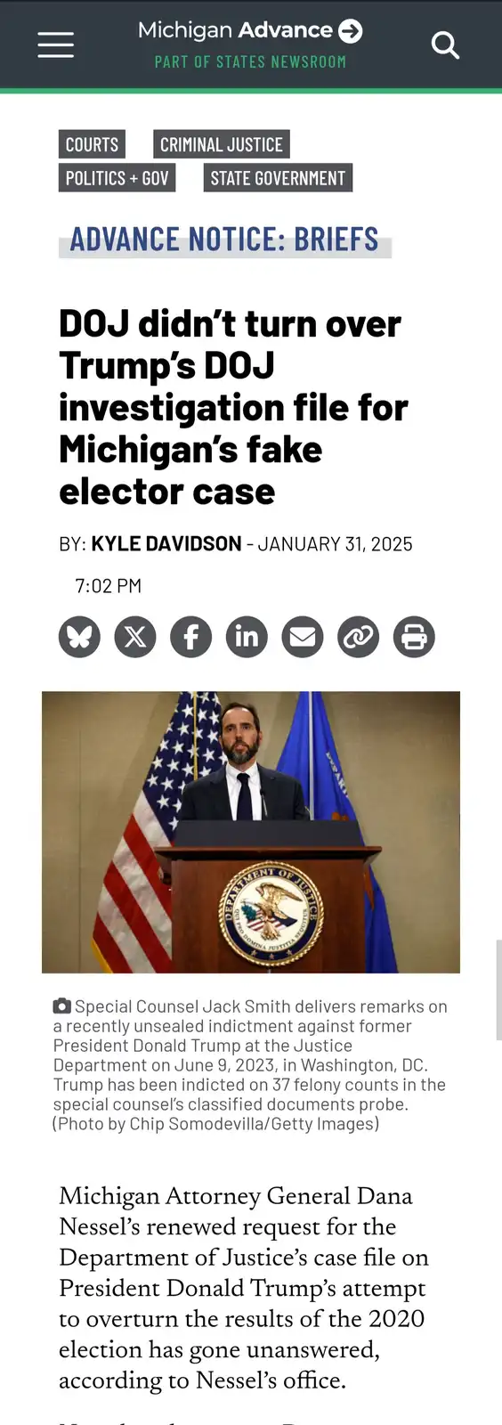 A screenshot of a Michigan Advance news article from January 31, 2025, with a headline stating the DOJ didn't turn over…