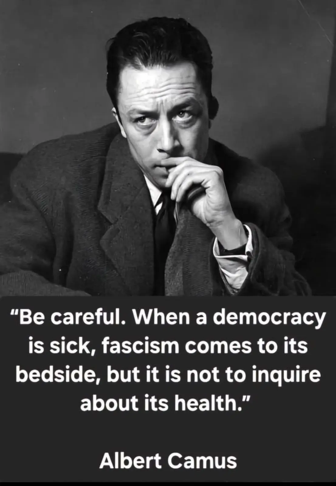 A black-and-white portrait of Albert Camus, looking pensive with his hand near his mouth, overlaid with a quote attributed…