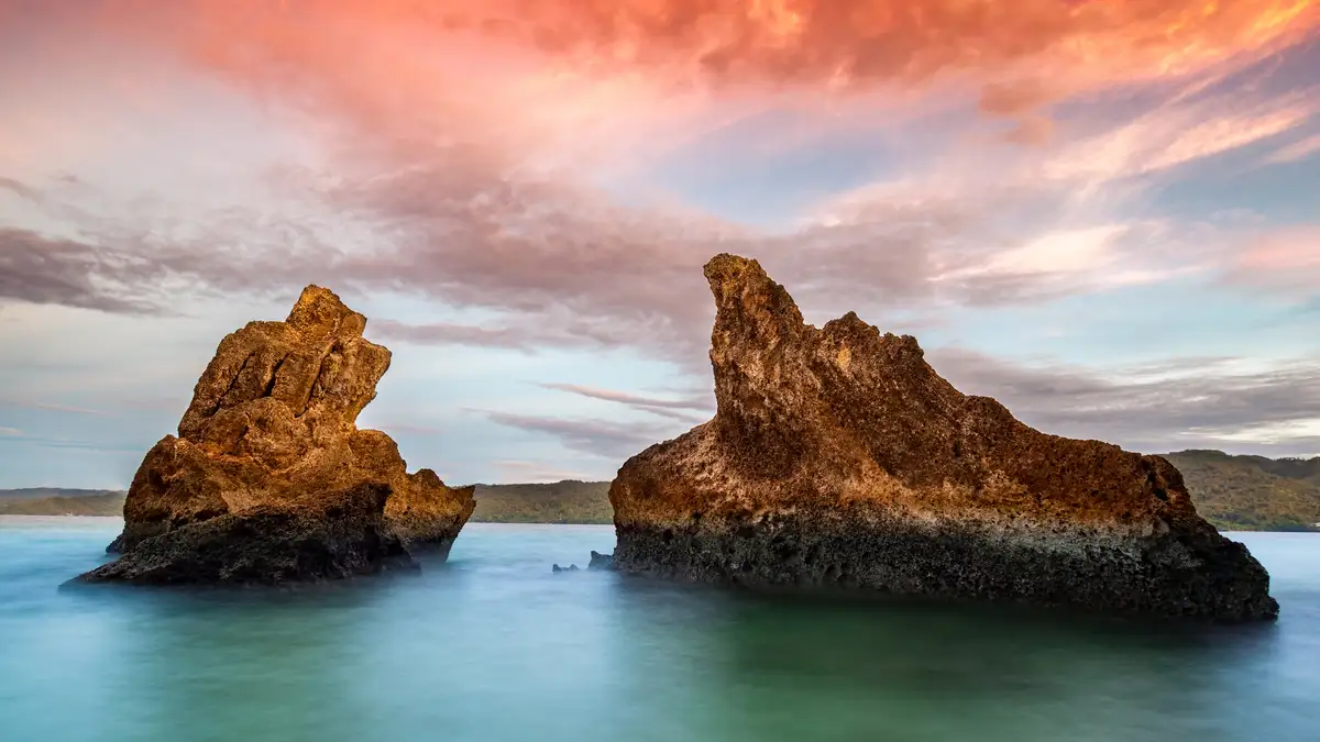 Off the Dominican Republic's northern coast, rugged rock formations stand out against the serene waters of SamanÃÂ¡ Bay…