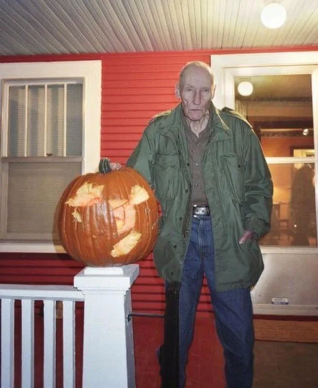 William S. Burroughs with His Hatchet-Carved Jack-O'-Lantern, 1996