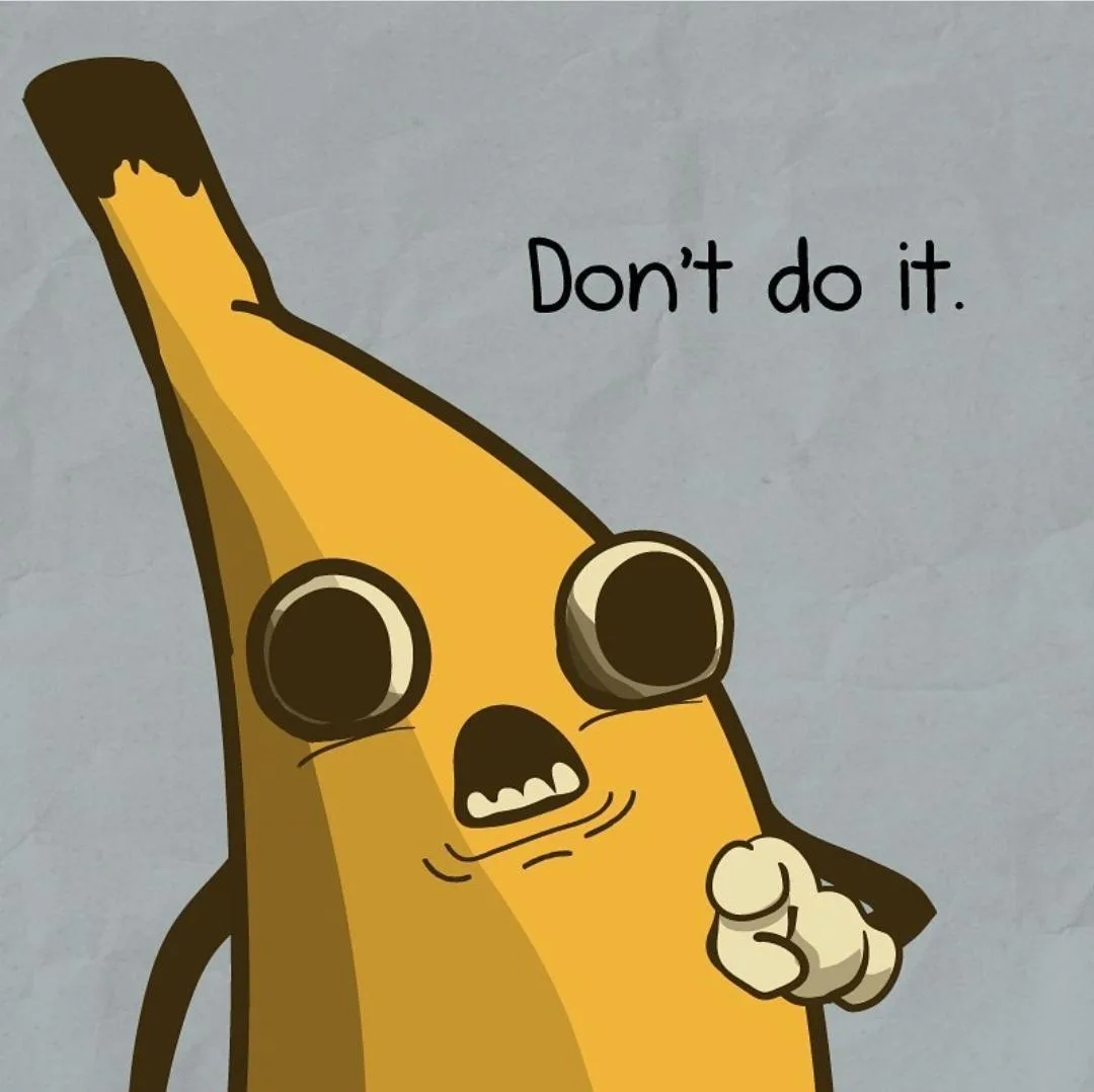 A cartoon banana with large, wide eyes and an open mouth showing teeth, looking alarmed and gesturing with a clenched fist…