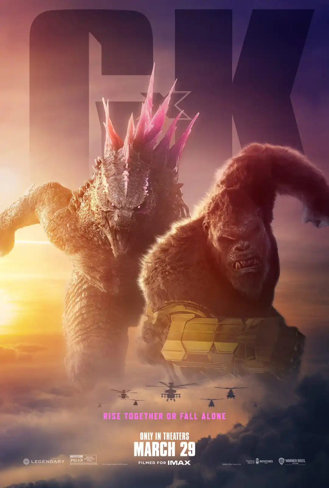 A movie poster for 'Godzilla vs. Kong' shows Godzilla and Kong standing side-by-side against a sunset sky with helicopters…