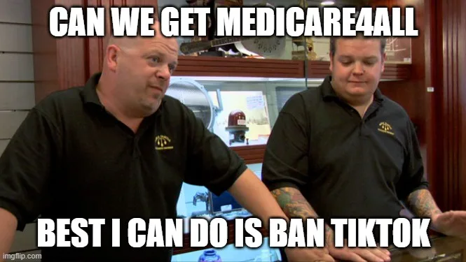 Two men in black polo shirts sit at a counter, one looking earnestly at the other who looks downcast. The text overlaid in…