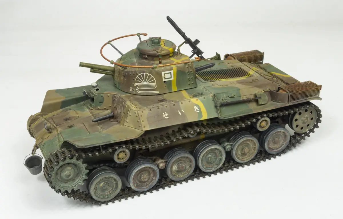 A detailed scale model of a Japanese Type 97 Chi-Ha medium tank, painted in camouflage with yellow stripes and Japanese…