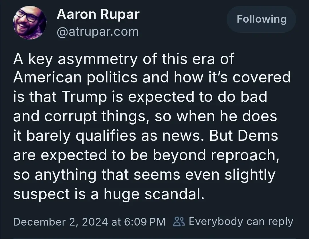 A screenshot of a tweet by Aaron Rupar (@atrupar.com) on a dark background. The tweet text discusses political asymmetry…