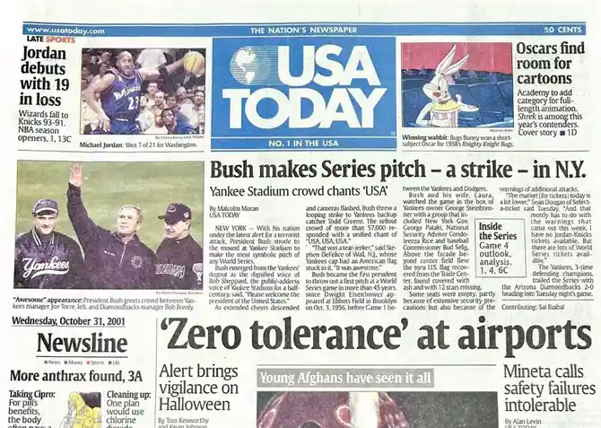 A newspaper front page from October 31, 2001, featuring headlines about Jordan's NBA loss, Bush's World Series speech, and a…