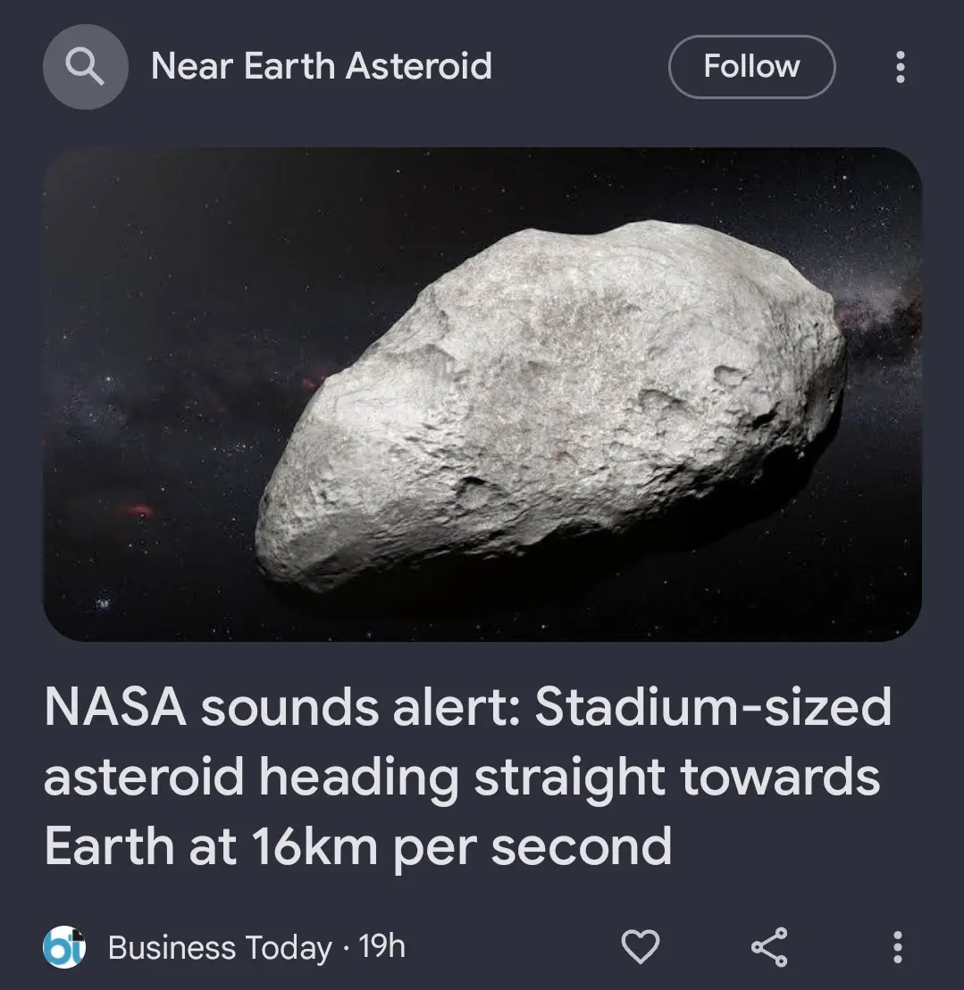 A screenshot of a news feed post shows a large, irregularly shaped gray asteroid against a starry space background. The…