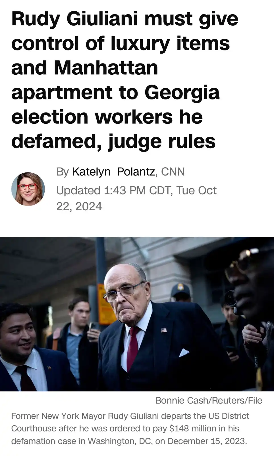 The image is a screenshot of a CNN news article with a headline about Rudy Giuliani being ordered by a judge to give control…