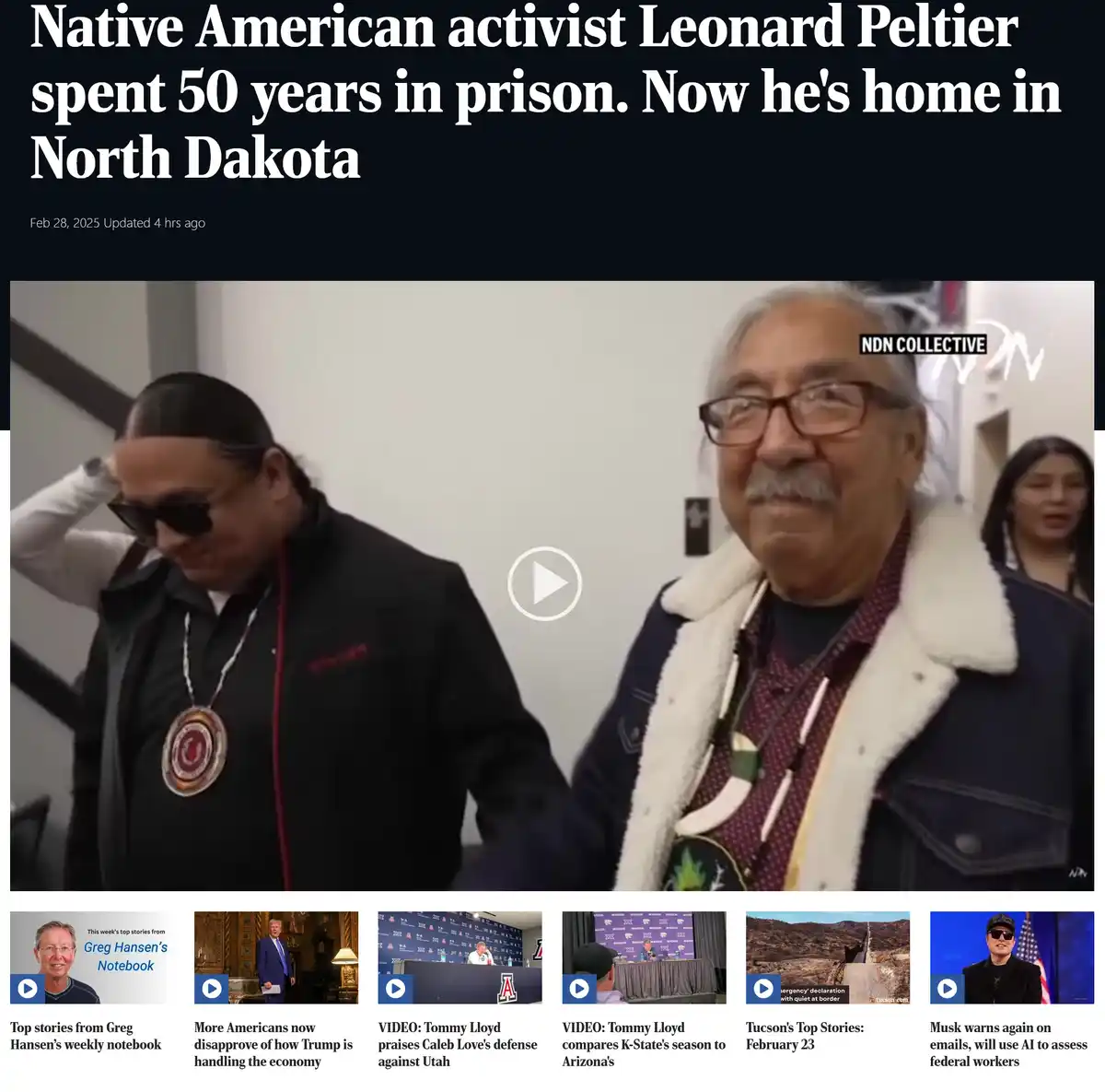 A screenshot of a news article header showing a video thumbnail of Leonard Peltier, an older Native American man with…