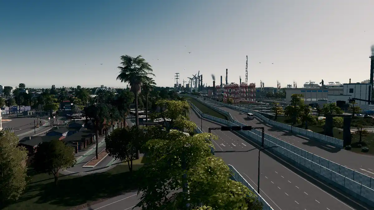 A screenshot from a city-building simulation game shows a wide highway leading toward a distant industrial zone with…