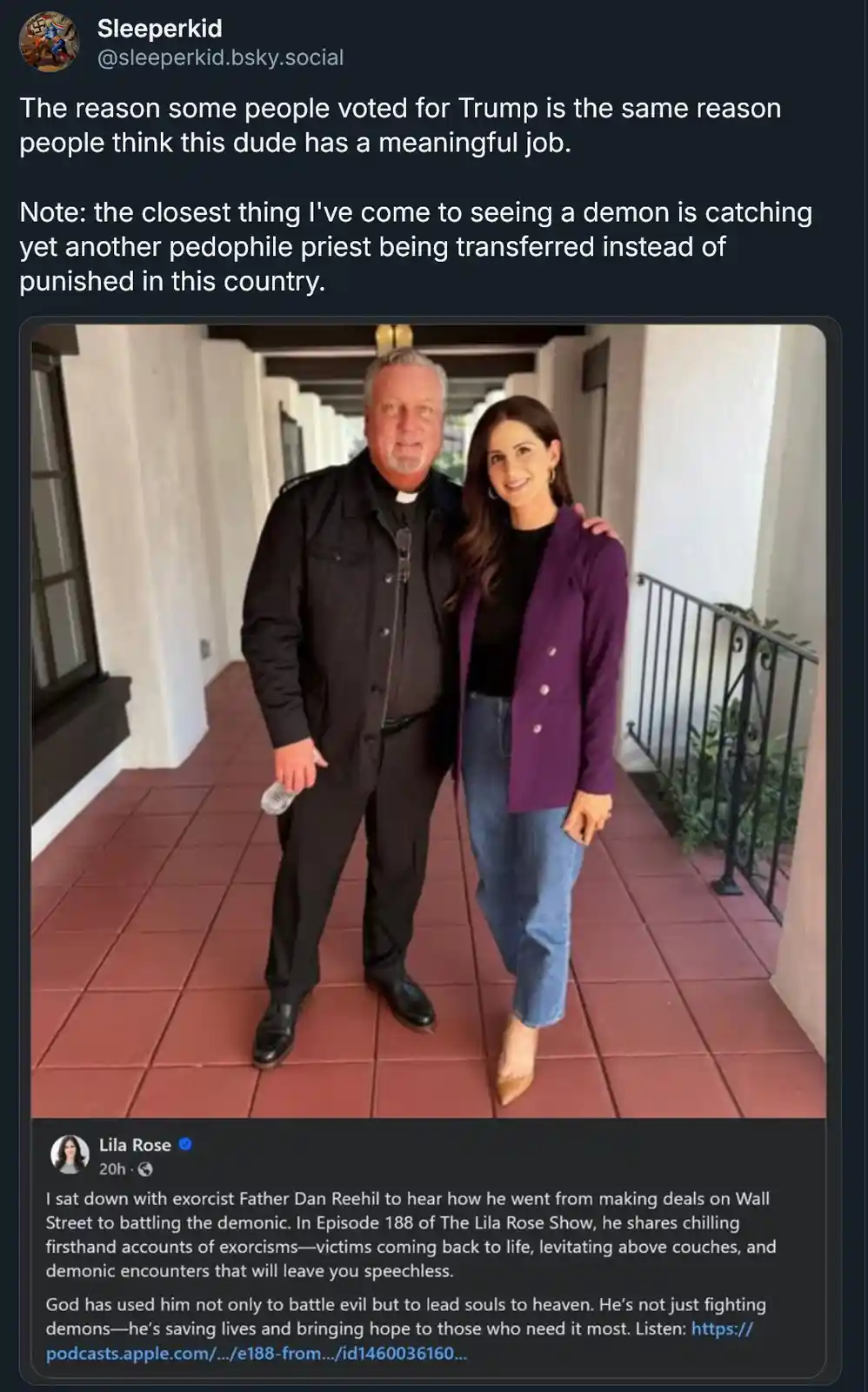 A man in a black clerical collar and jacket stands beside a smiling woman in a purple blazer and jeans on a tiled walkway…