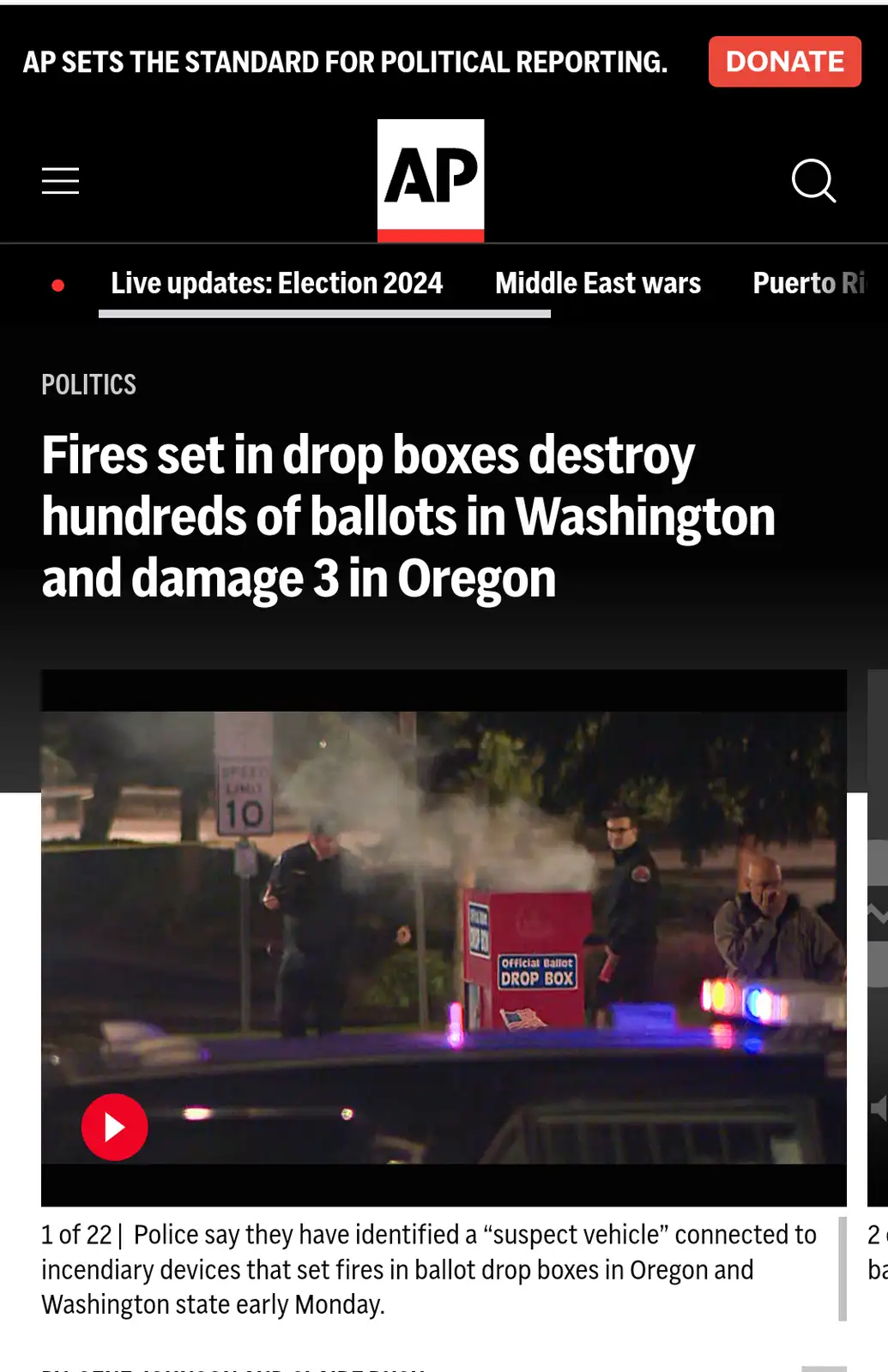 A screenshot of an Associated Press news article shows a nighttime scene with police officers near a smoking red 'Official…