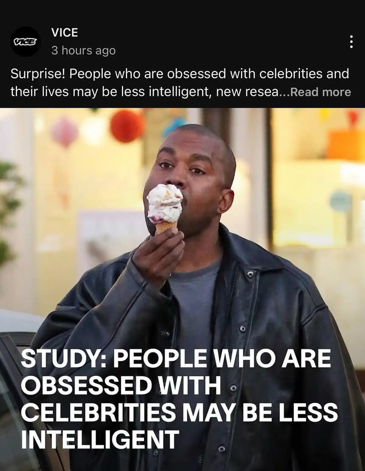 A man in a black leather jacket is eating a cone of ice cream while looking slightly to his right. Overlaid in large white…