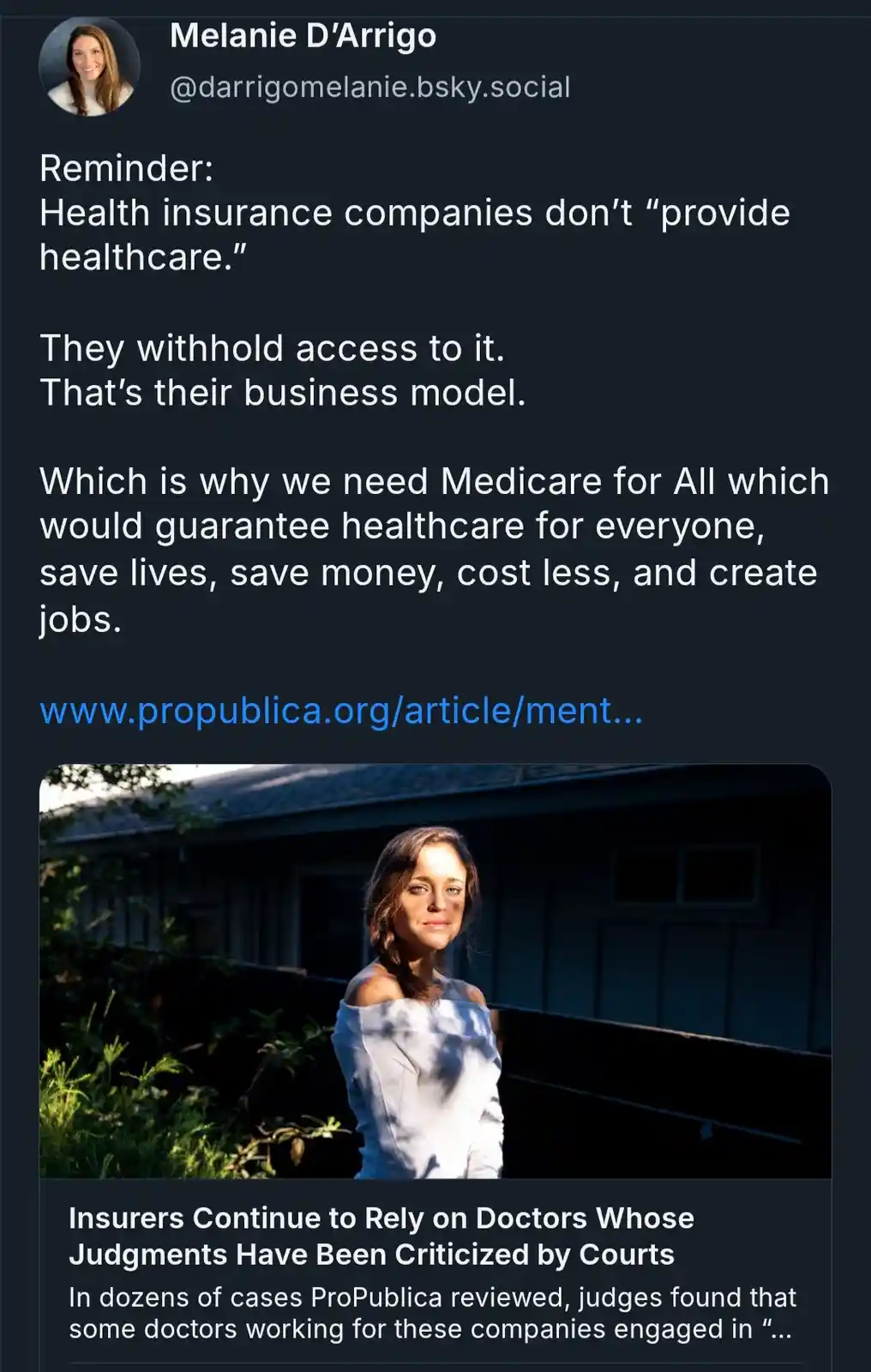 A screenshot of a social media post by Melanie D'Arrigo, featuring a photo of a woman in a white off-the-shoulder top…