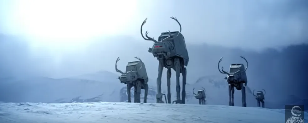 A snowy landscape features several AT-AT walkers from Star Wars, humorously modified with large, curved antlers on their…