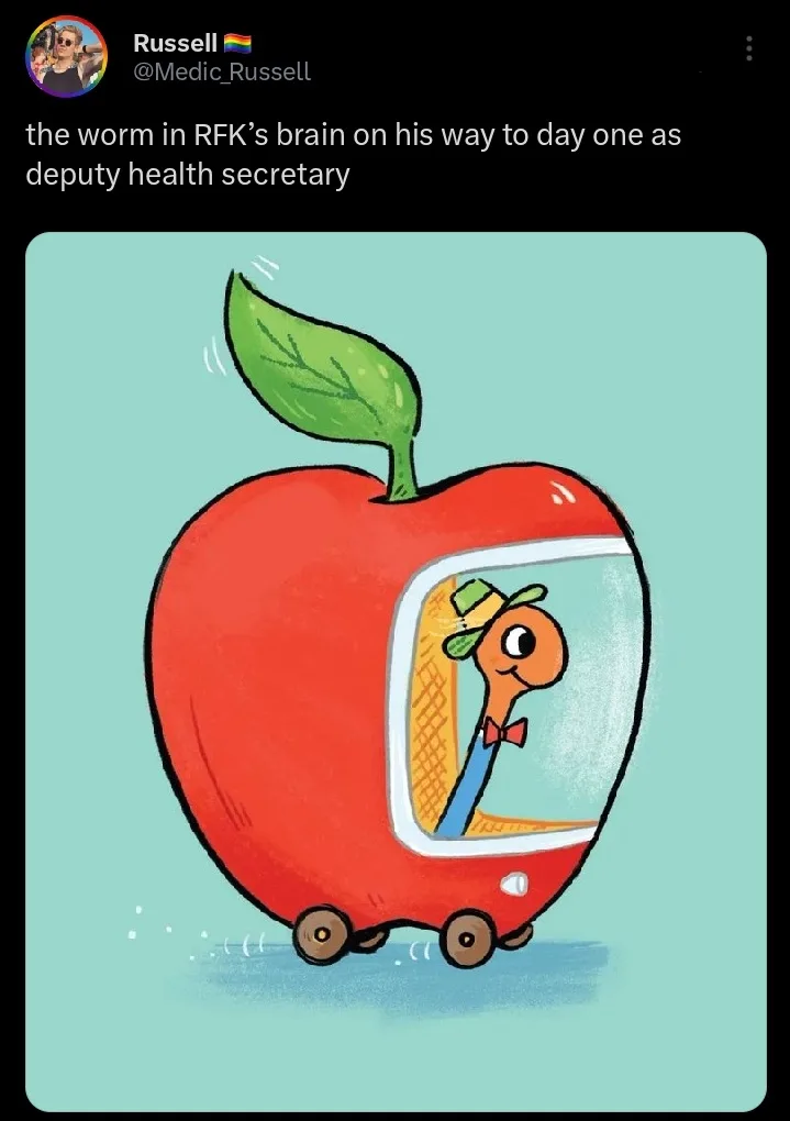 A cartoon illustration shows a red apple with wheels and a green leaf, resembling a car, with a worm wearing a green hat and…