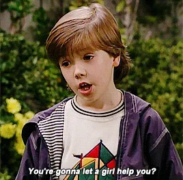 A six-panel image sequence shows a young boy with brown hair wearing a purple zip-up hoodie over a striped shirt with a…