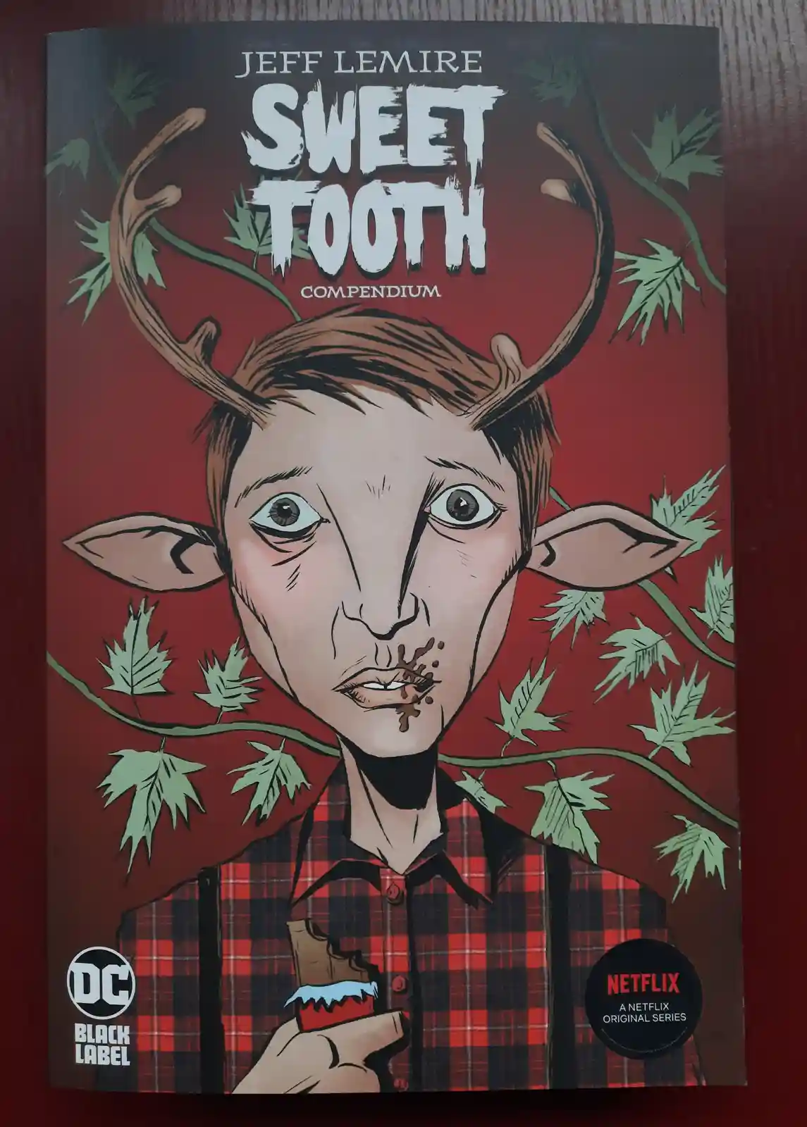 The image shows the cover of the 'Sweet Tooth Compendium' comic book by Jeff Lemire, featuring a humanoid deer character…