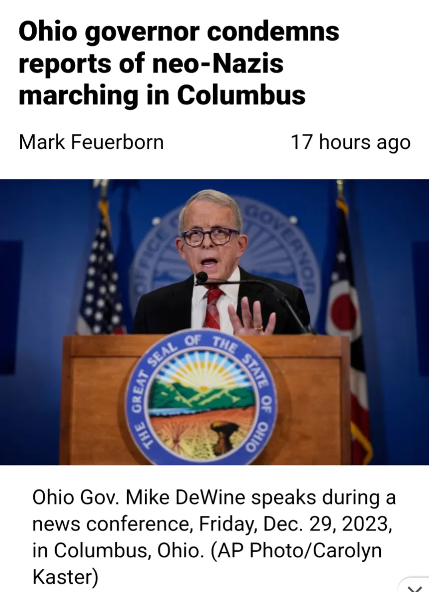 A screenshot of a news article header shows Ohio Governor Mike DeWine speaking at a podium with the Great Seal of Ohio. The…