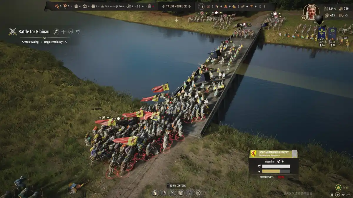 A screenshot from the strategy game 'Mount & Blade: Warband' shows a large army of light mercenary infantry crossing a…