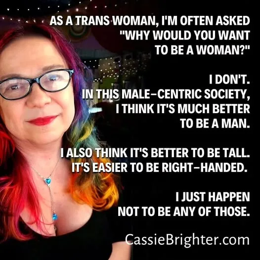 A woman with rainbow-colored hair and glasses looks at the camera while overlaid text humorously responds to the question…
