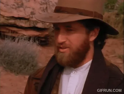 A three-panel meme showing a man in a cowboy hat and beard looking determined, then a man in a tan coat and hat walking away…