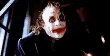 A six-panel sequence from the movie 'The Dark Knight' showing the Joker (played by Heath Ledger) in a dark, confined space…